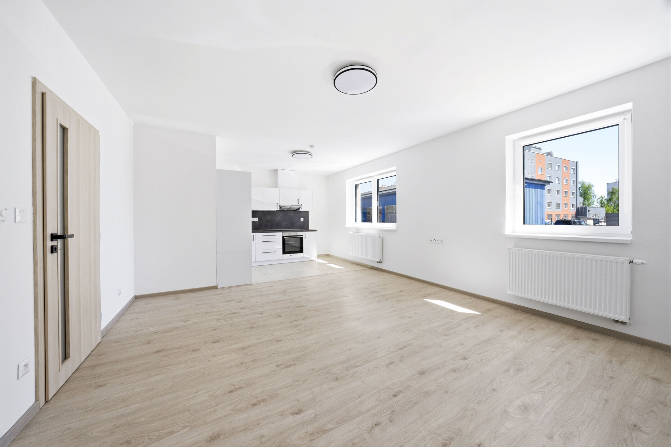Prostorn&yacute; byt 1+kk s parkovac&iacute;m st&aacute;n&iacute;m, 39 m2