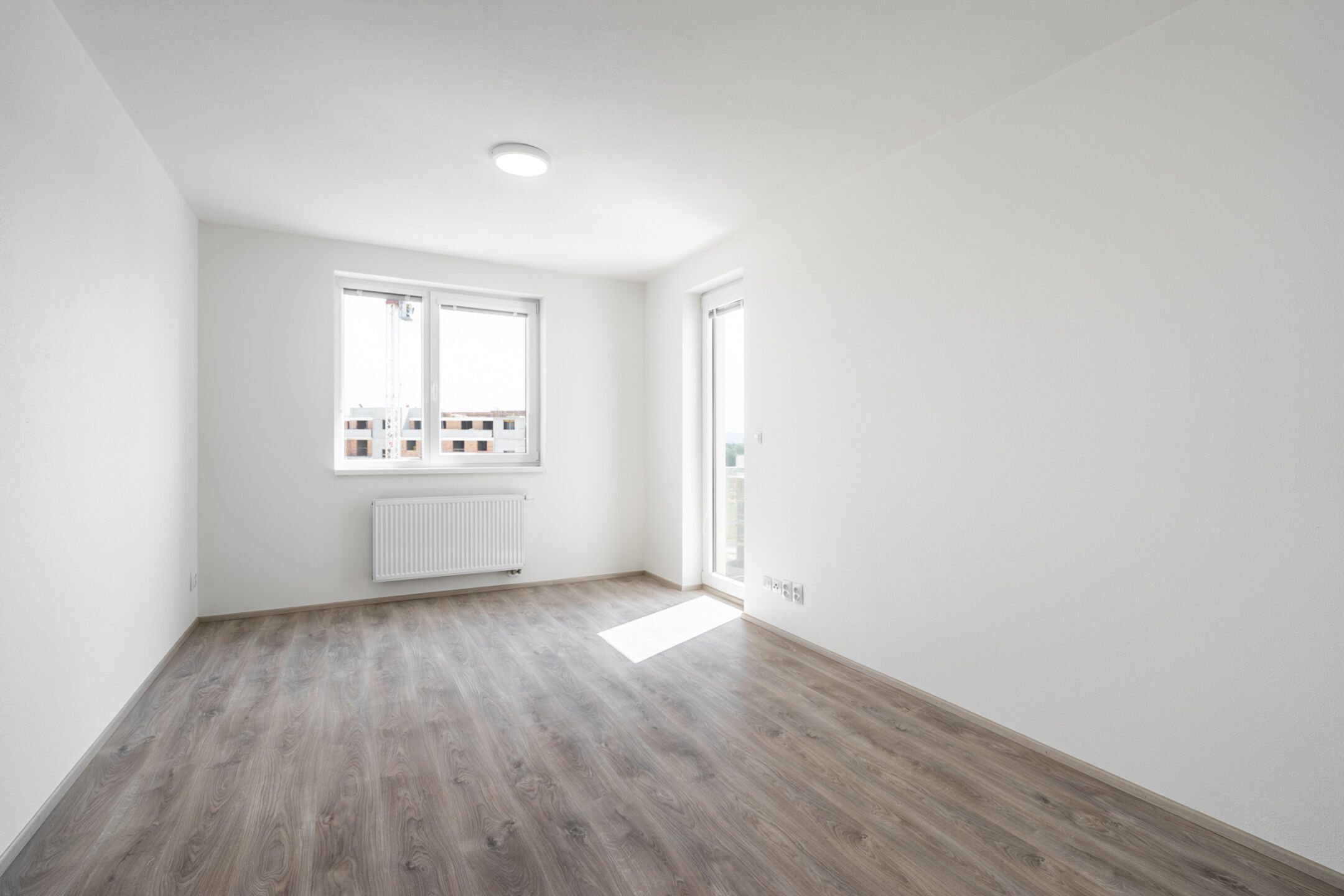 Byt 2+kk s balkonem a parkovac&iacute;m st&aacute;n&iacute;m, 44 m2