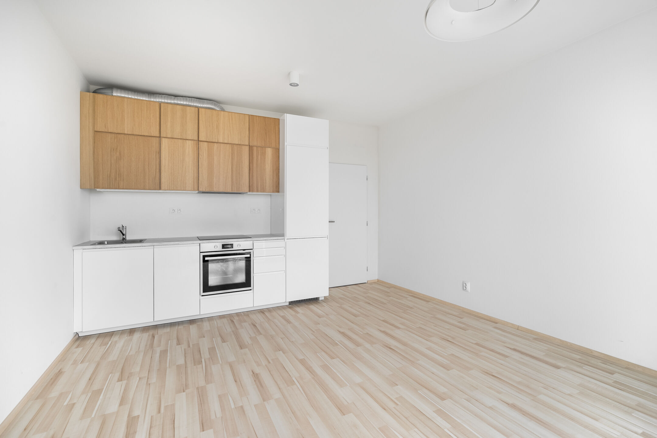 Modern&iacute; byt 1+kk s balkonem a gar&aacute;žov&yacute;m st&aacute;n&iacute;m, 29 m2